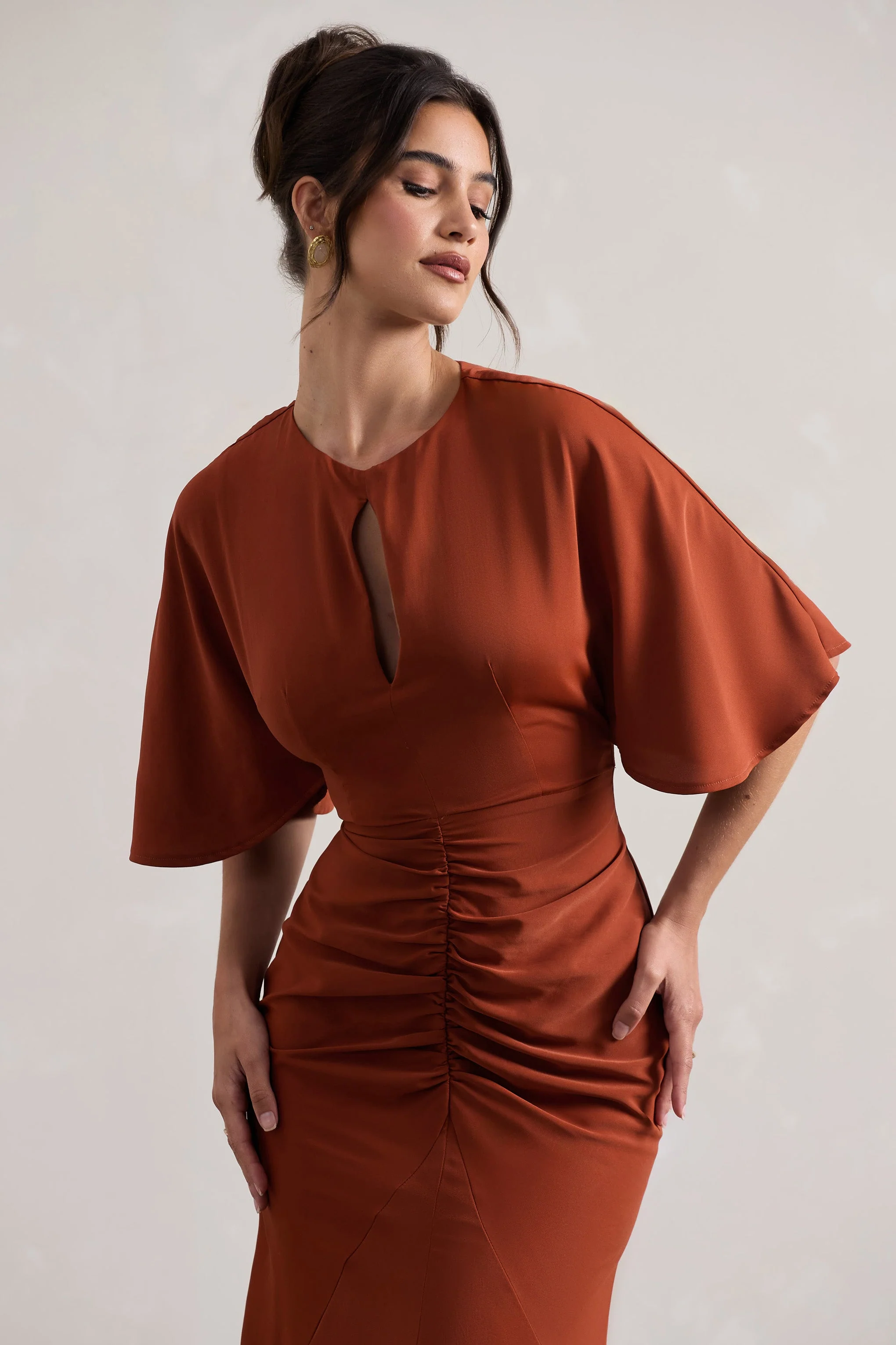 2616-elidy-terracotta-ruched-flutter-sleeve-cut-out-maxi-dress-1.webp