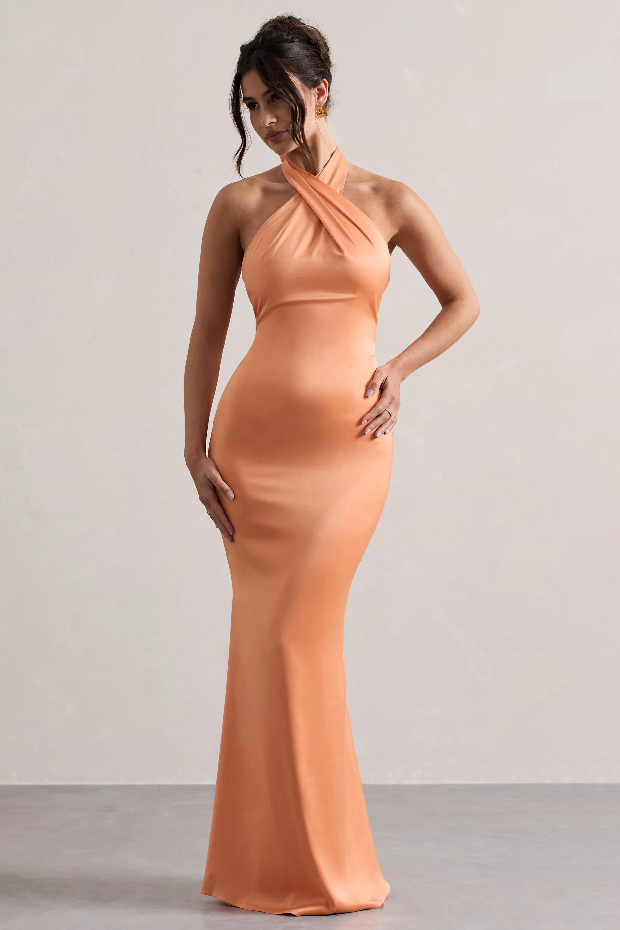 4277-unbeatable-peach-satin-cross-over-halter-neck-maxi-dress-1.webp