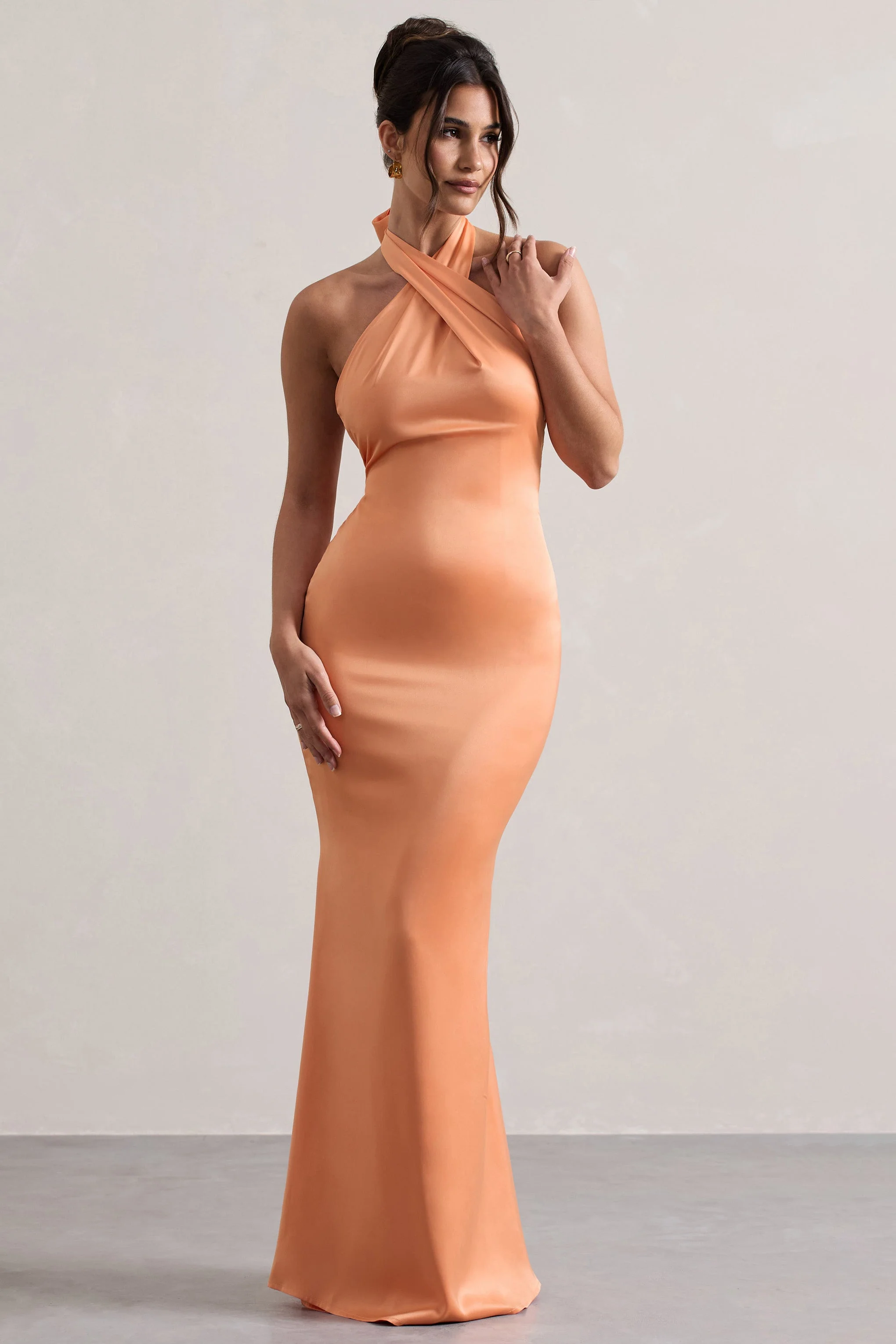 4277-unbeatable-peach-satin-cross-over-halter-neck-maxi-dress-1.webp