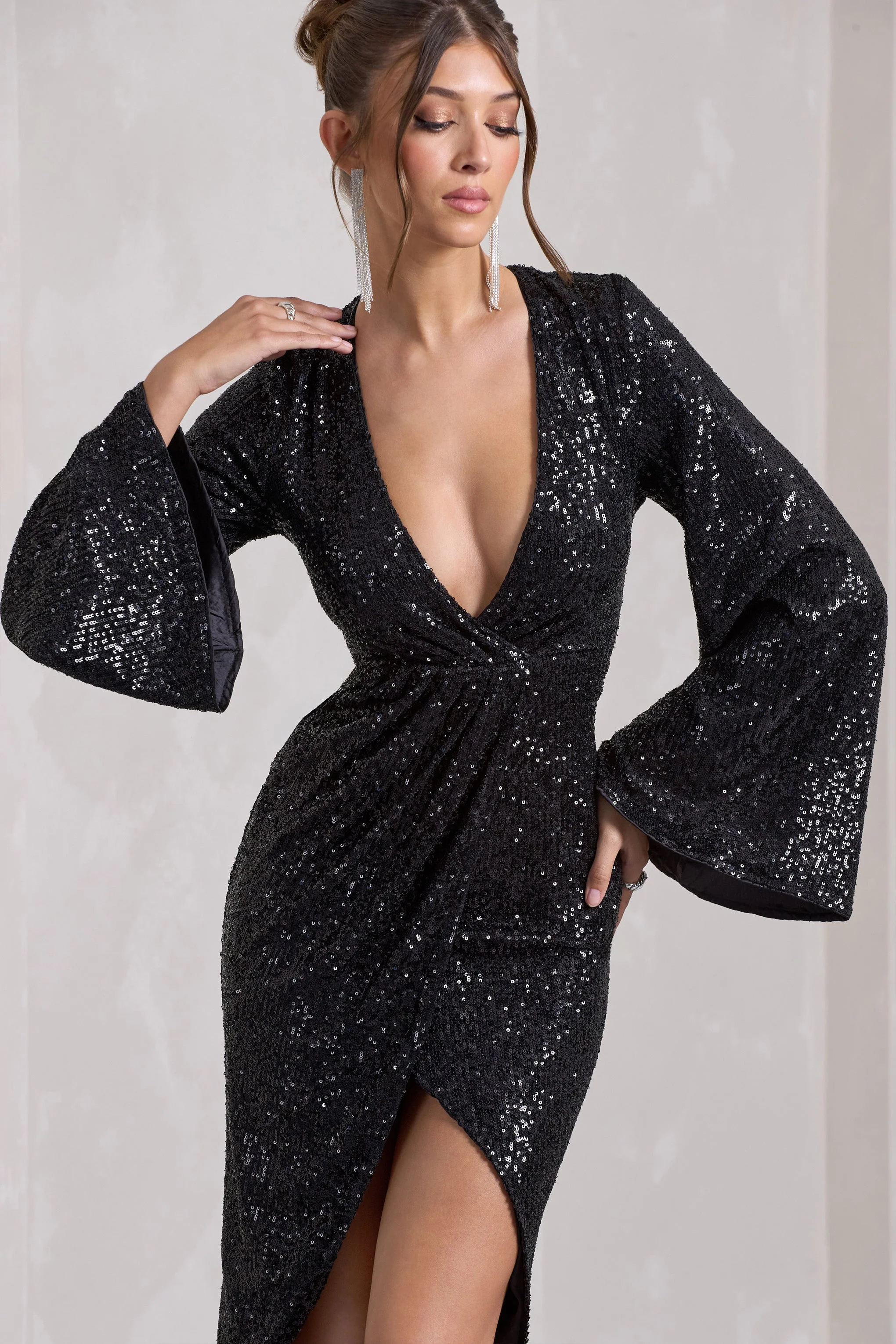 476-amber-black-sequin-plunge-wrap-midi-dress-1.webp