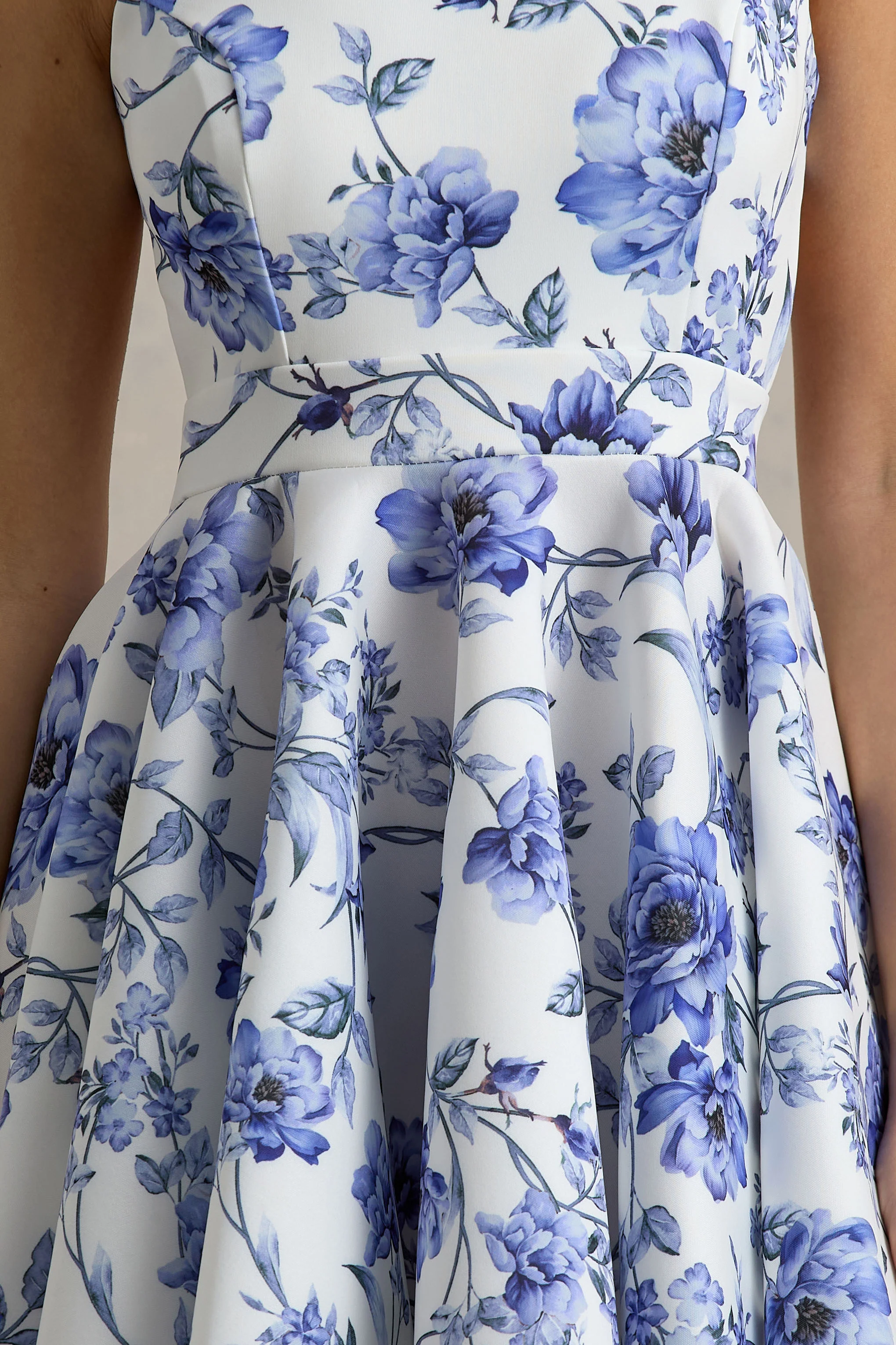 5590-waverly-blue-floral-racer-neck-sleeveless-skater-mini-dress-1.webp