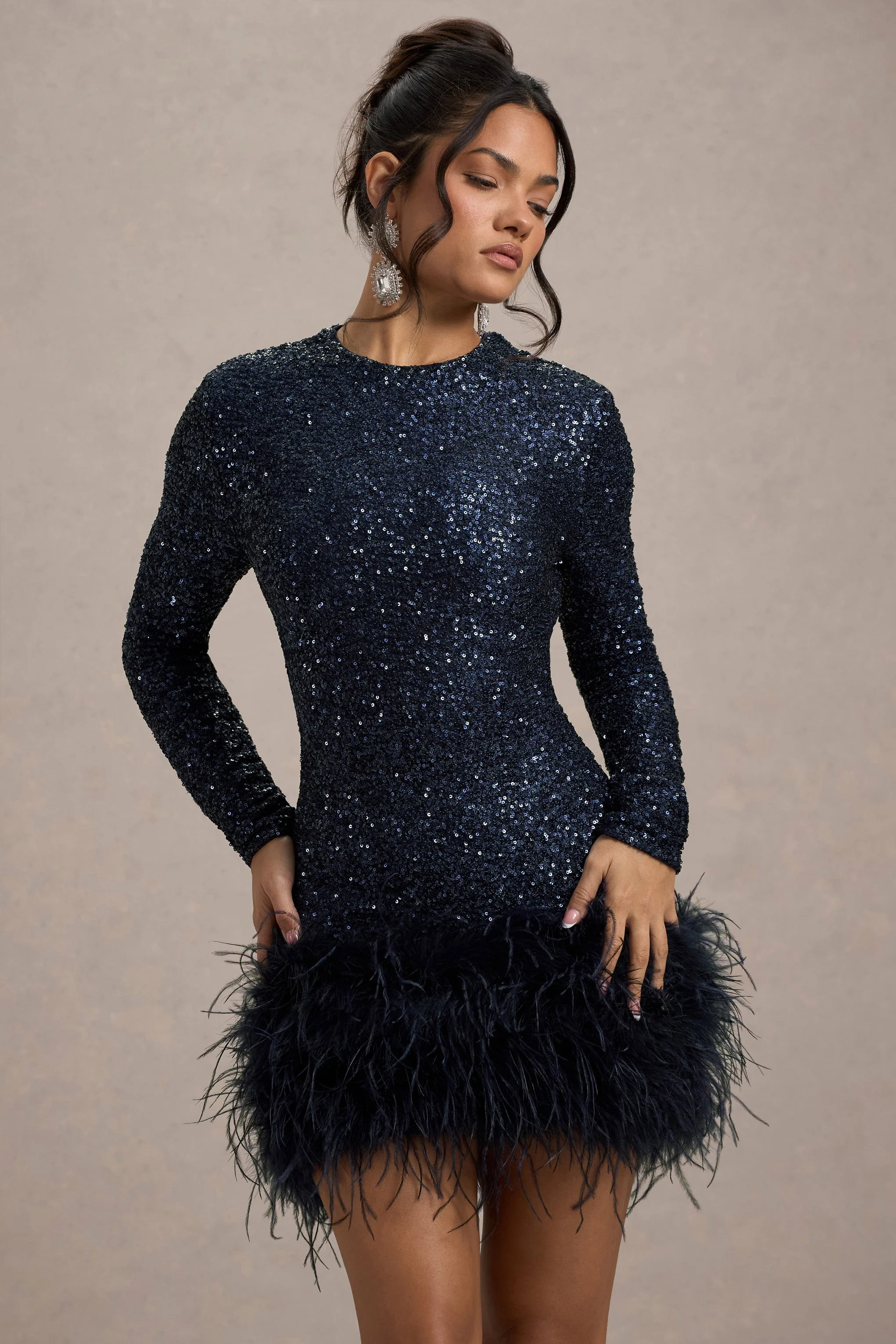 5785-claudia-navy-sequin-high-neck-feather-hem-mini-dress-with-long-sleeves-1.webp