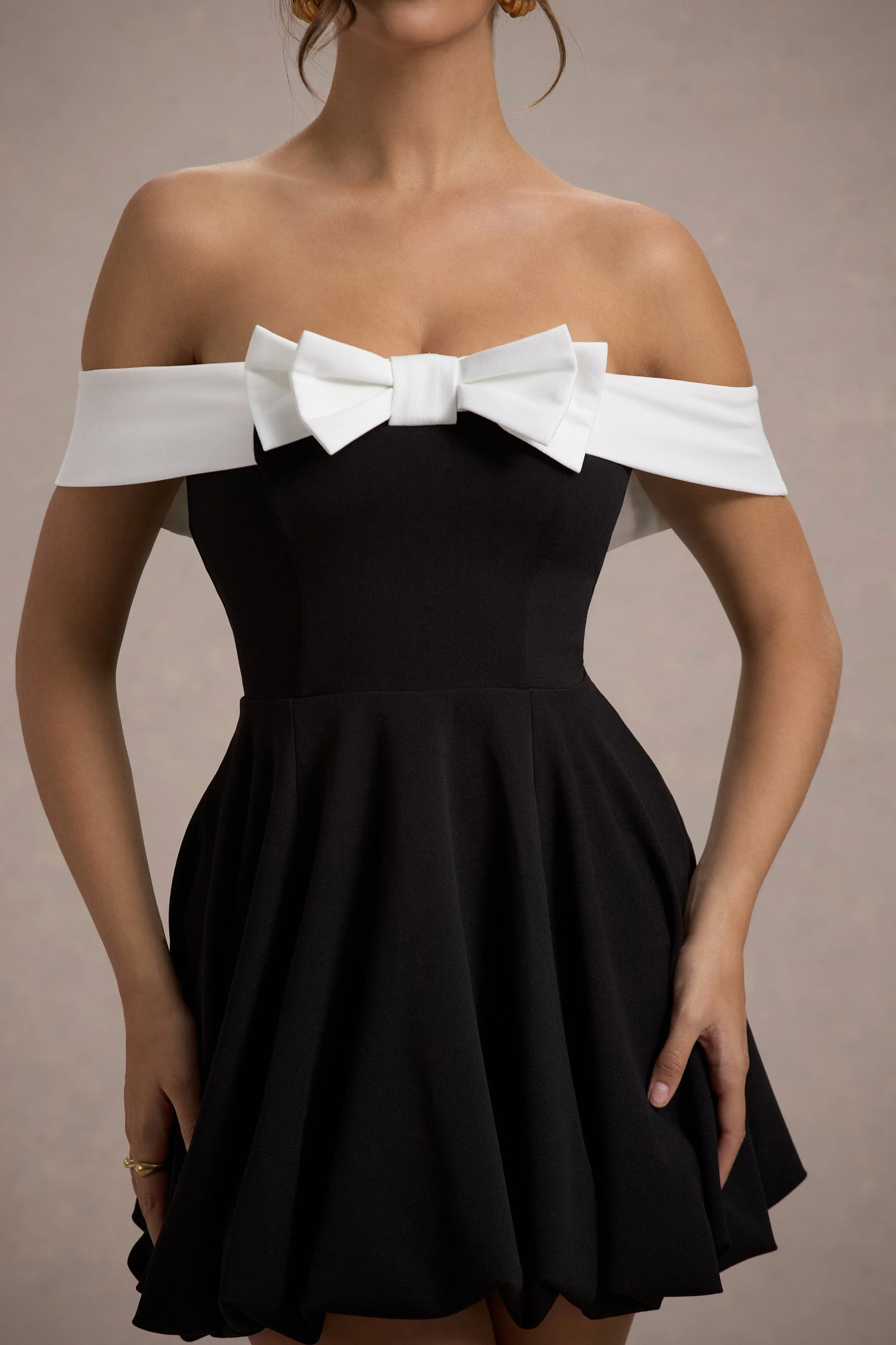 6440-minimoiselle-black-white-bow-bardot-mini-dress-with-puff-ball-skirt-1.webp
