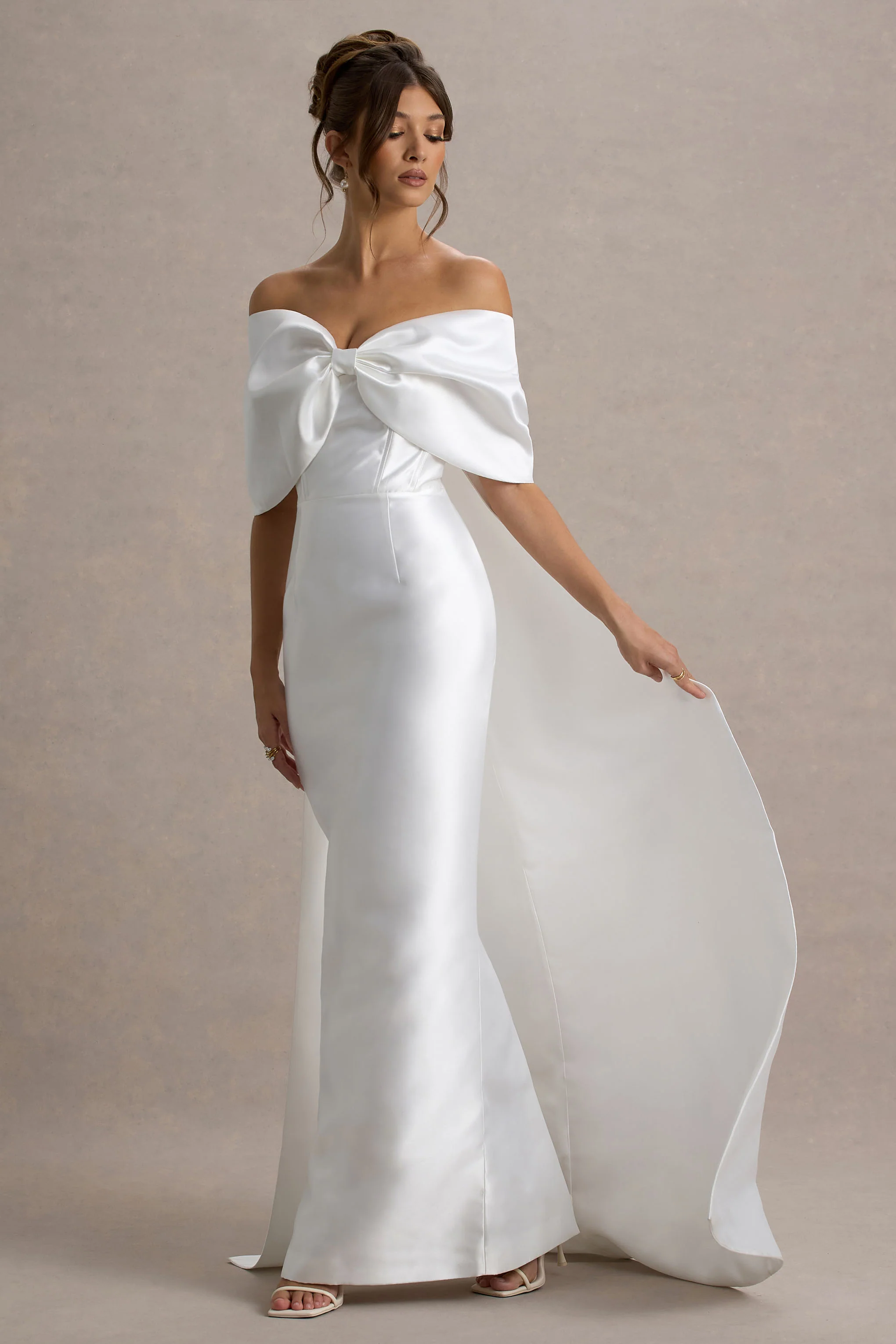 6692-wanting-more-off-white-satin-cape-maxi-dress-with-oversized-bow-1.webp