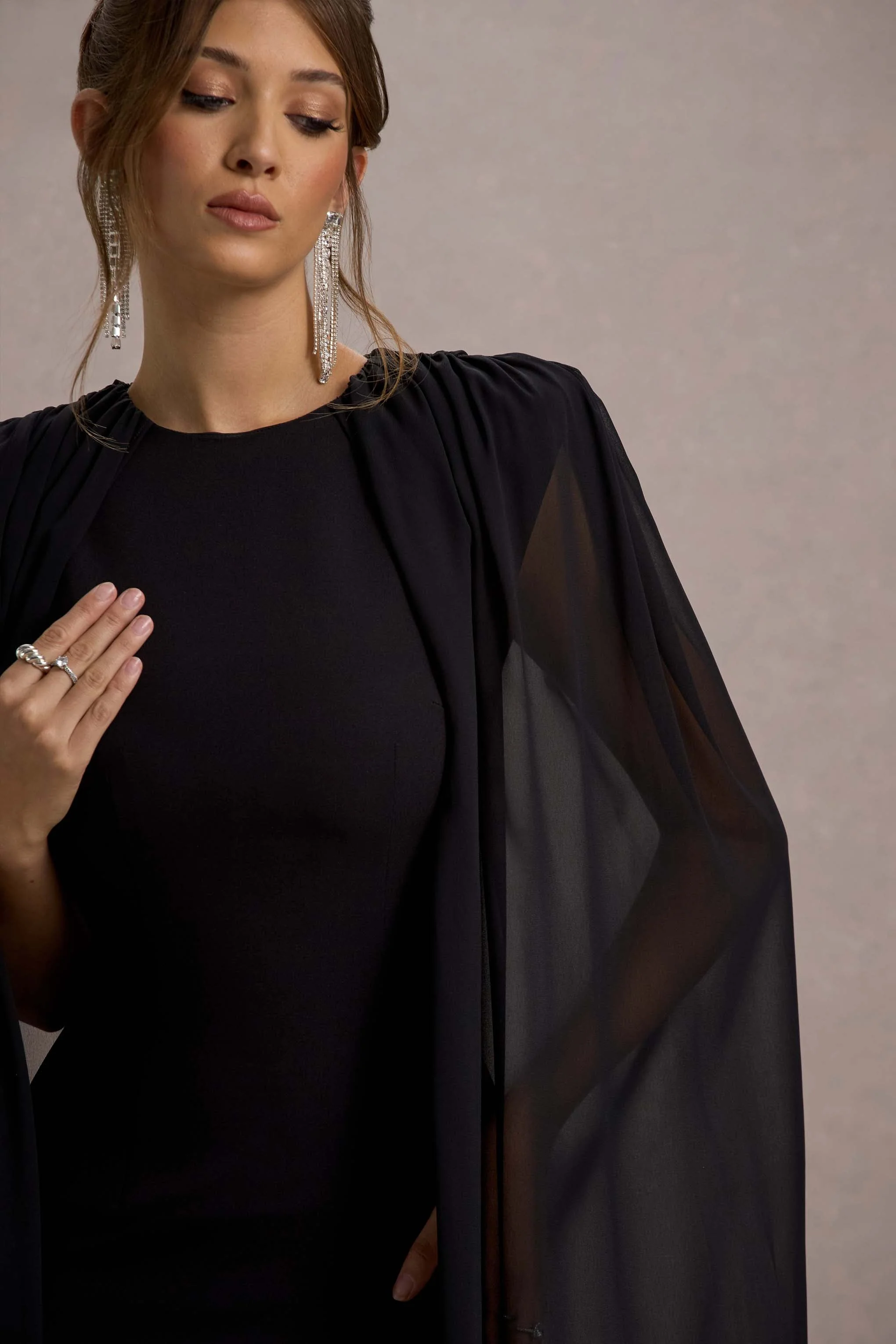 6930-elysium-black-bodycon-mini-dress-with-chiffon-cape-1.webp