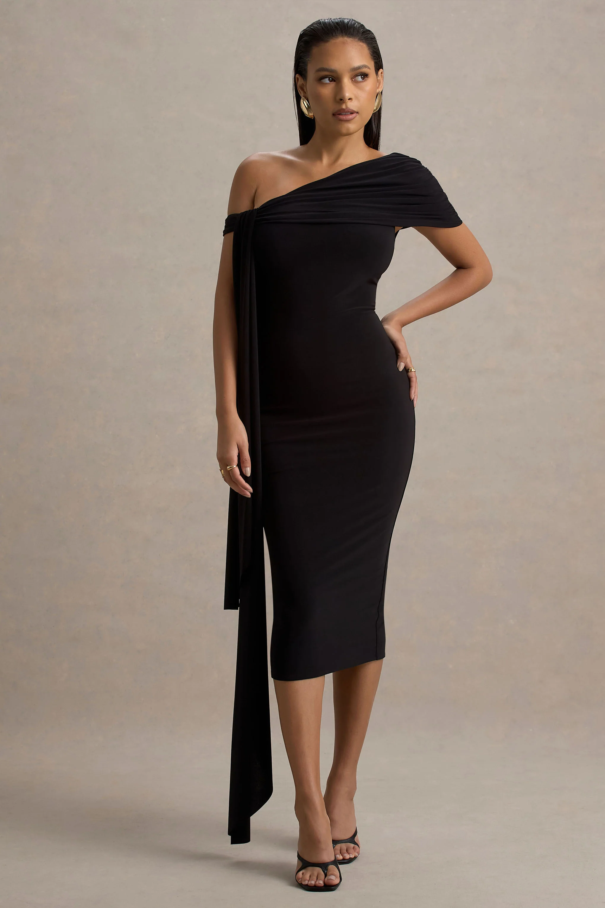 8354-vallea-black-one-shoulder-draped-midi-dress-1.webp