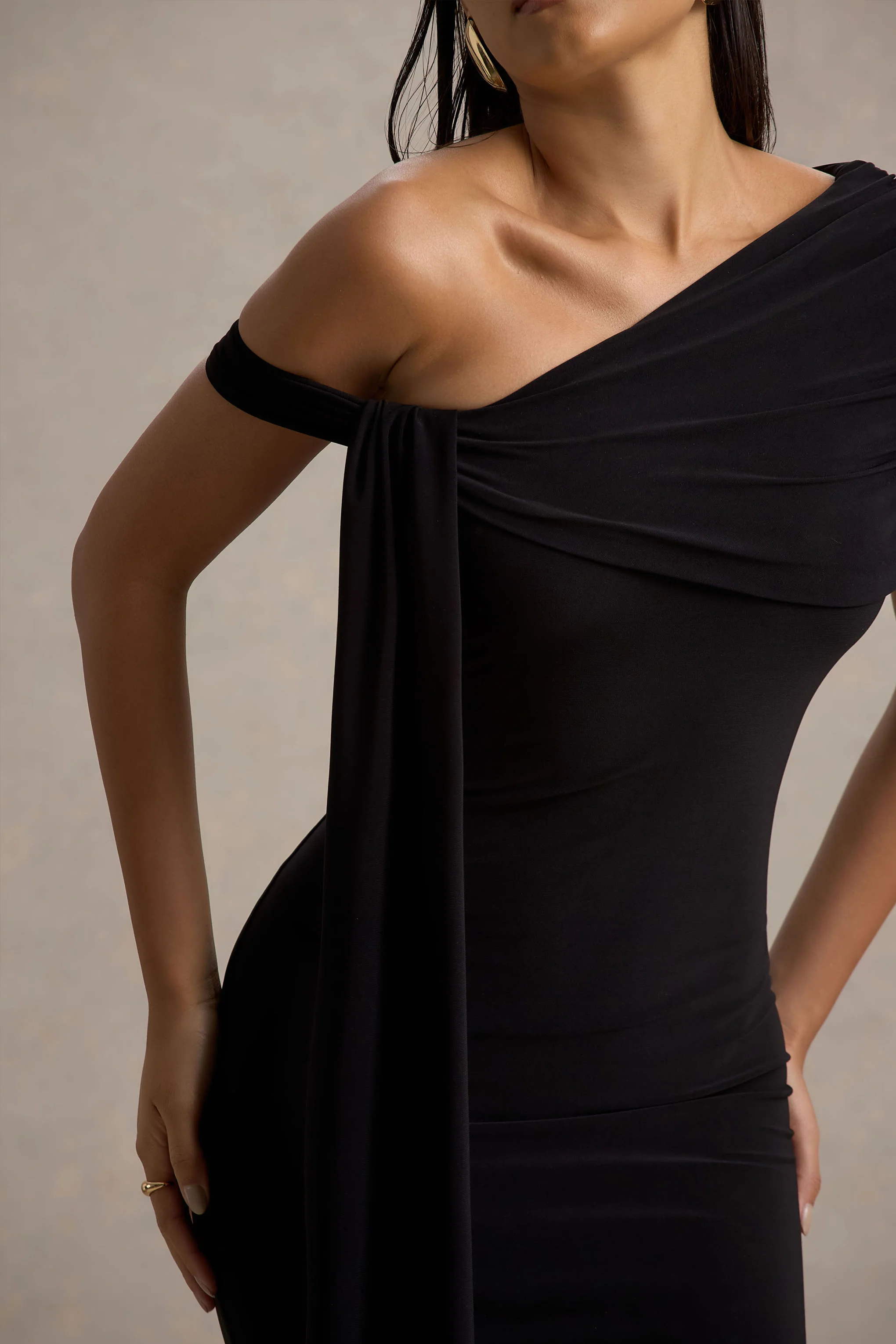 8354-vallea-black-one-shoulder-draped-midi-dress-1.webp