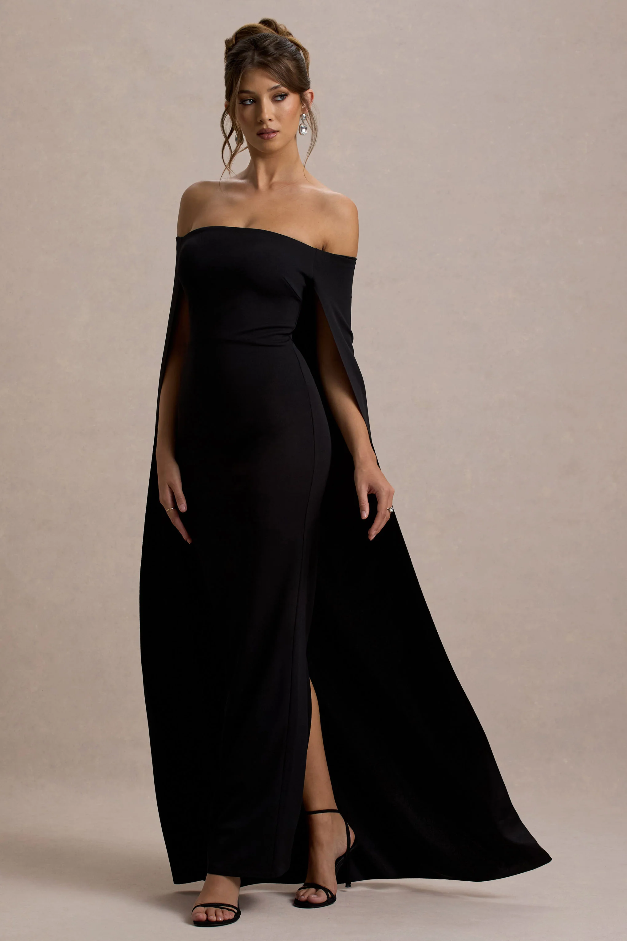 9081-genovia-black-bardot-cape-maxi-dress-1.webp