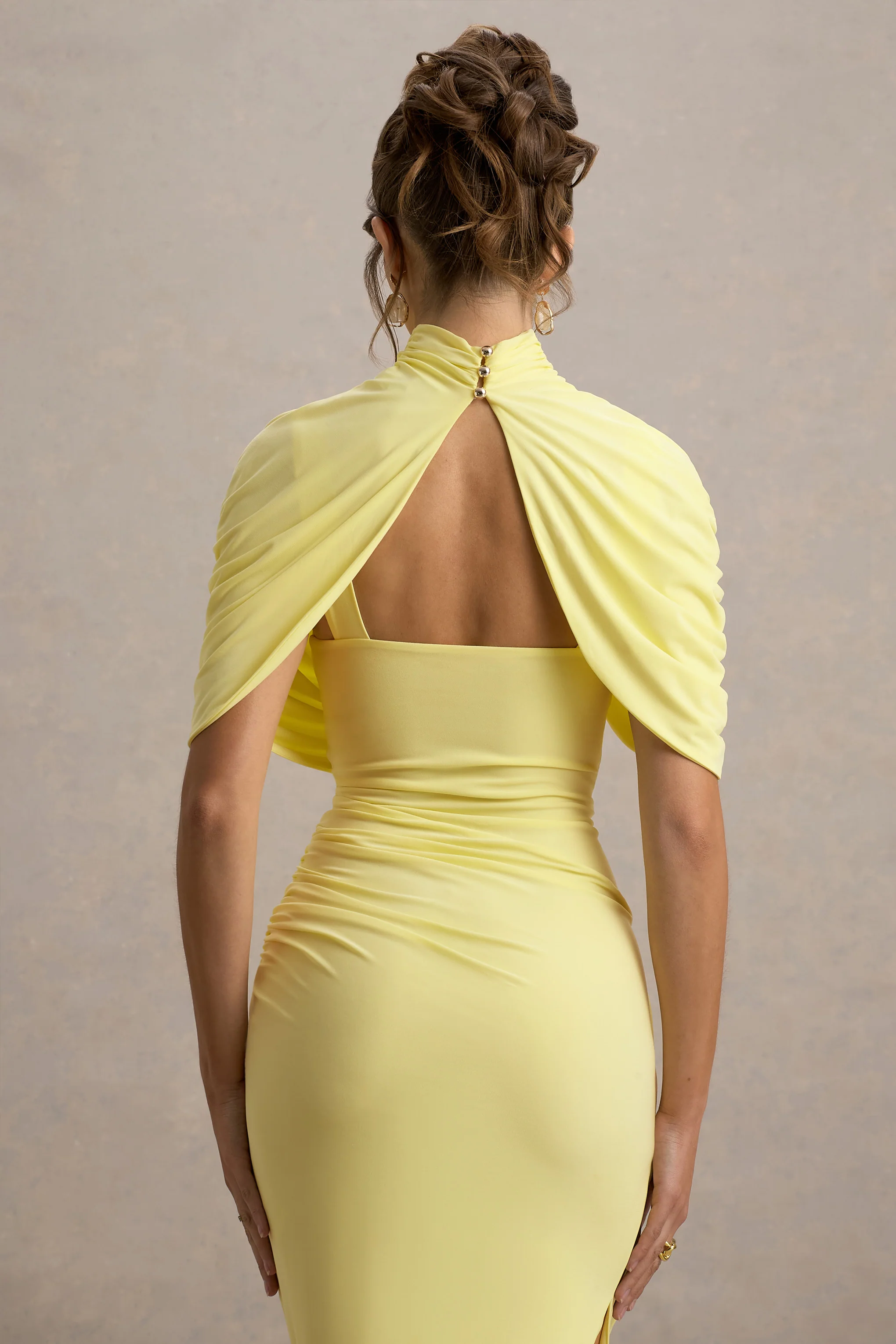 9479-enchant-lemon-asymmetric-twisted-cape-midi-dress-1.webp